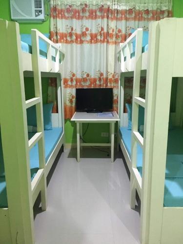 OYO 819 Twin Ap Homes Room Type - 4-Bed Mixed Dormitory Room