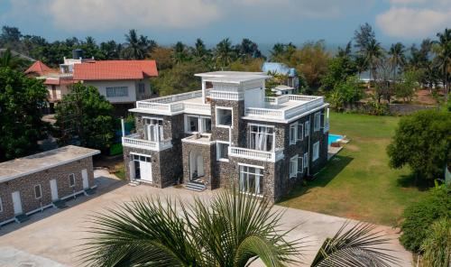 SaffronStays  Palm Paradise 6 BHK Villa 𝗕𝗢𝗢𝗞 Bhiwandi Villa 𝘄𝗶𝘁𝗵  ₹𝟬 𝗣𝗔𝗬𝗠𝗘𝗡𝗧