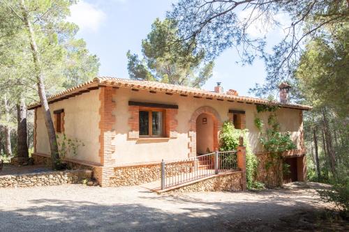 Jardí, AldeaMia, Cozy villa for 7 people, pool, mountain view, beach at 8 min in Vilanova d'Escornalbou