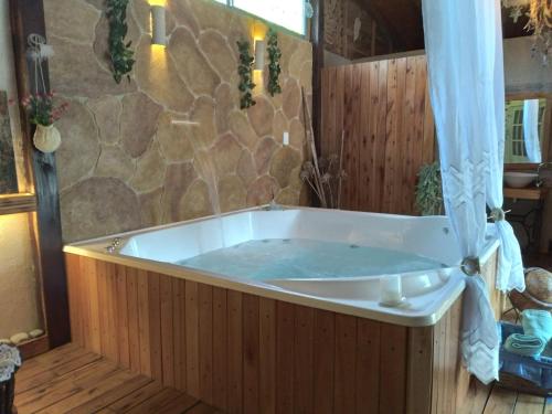 Hot tub, Pualy Resort & Spa in Belén De Escobar