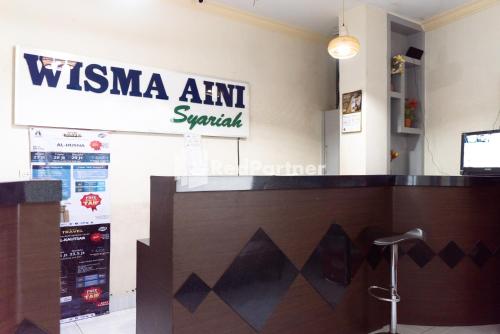 Hall, Wisma Aini Syariah Lampung Mitra RedDoorz in Bandar Lampung