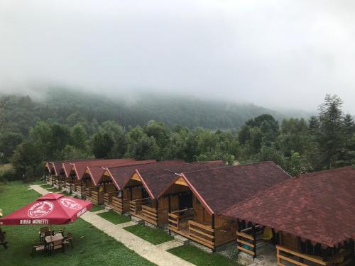 Căsuțele Doftanei - Chalet - Teşila