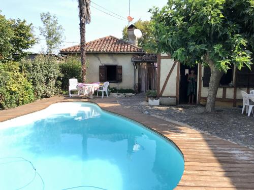 Maison d'une chambre avec piscine partagee jardin clos et wifi a Gee Riviere