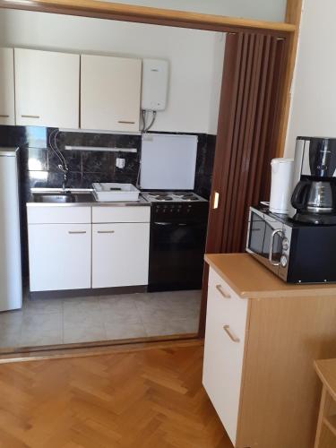 Apartments with a parking space Novi Vinodolski - 15412 - main image