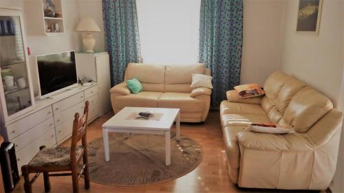 Three-Bedroom Apartment with Balcony and Sea View