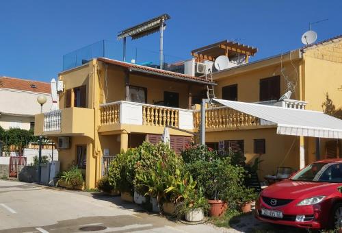 Apartments by the sea Posedarje, Novigrad - 15786