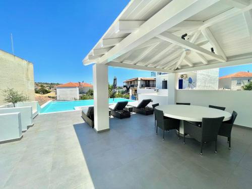 Portoheli Villa Downtown, Pool & Port view