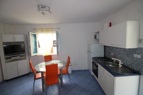 virtuve, Apartments by the sea Cove Vela Stiniva, Hvar - 17075 in Zastražišće