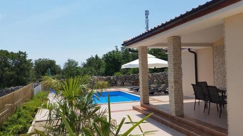 Holiday house with a swimming pool Vrh, Krk - 17073