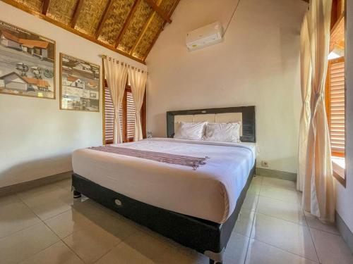 Aira Homestay near Pantai Kuta Mandalika Mitra RedDoorz