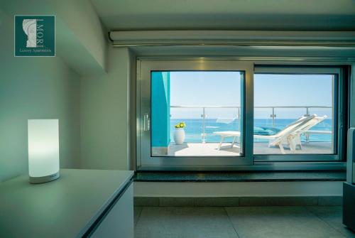 "I MORI LUXORY APARTMENTS" - Attico mansardato con incantevole vista mare