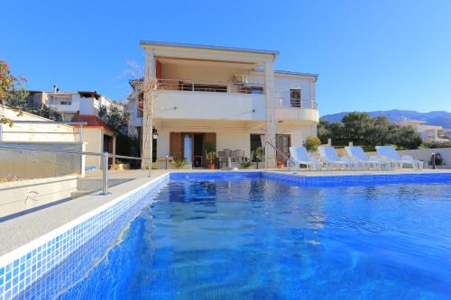 Apartments with a swimming pool Zrnovnica, Split - 18147 - Žrnovnica