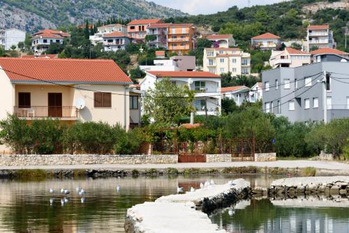 Apartments by the sea Seget Vranjica, Trogir - 18229 · Vranjča