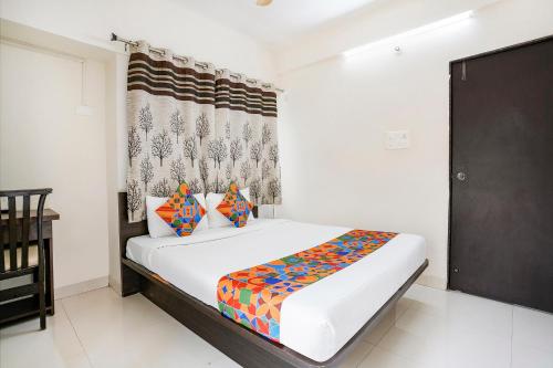 FabHotel Vardhan House II