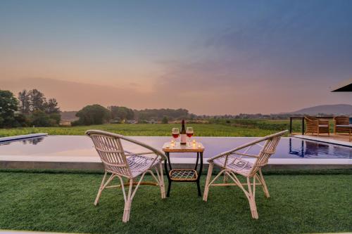 SaffronStays Onellaa, Nashik - infinity pool villa surrounded by a vineyard