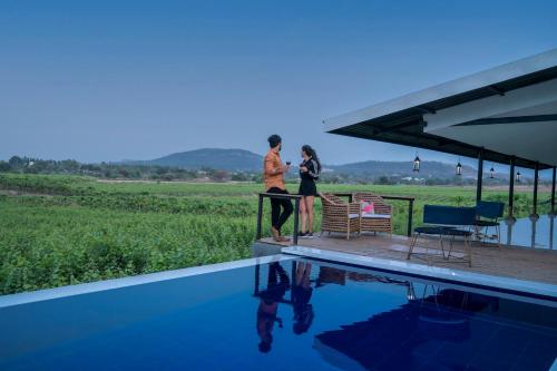 SaffronStays Onellaa, Nashik - infinity pool villa surrounded by a vineyard