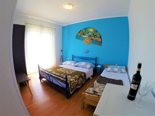 Apartments and rooms with parking space Lopar, Rab - 19238 in Rab