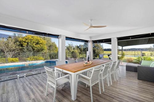 The Home Resort - Heated Pool and Tennis Court in Уан Маил Бийч