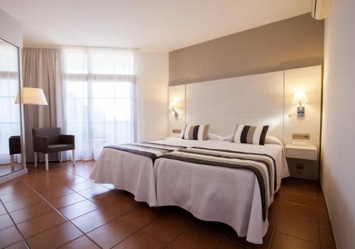 Hotel Tres Torres Hotel Tres Torres is perfectly located for both business and leisure guests in Ibiza. Both business travelers and tourists can enjoy the propertys facilities and services. Service-minded staff will w