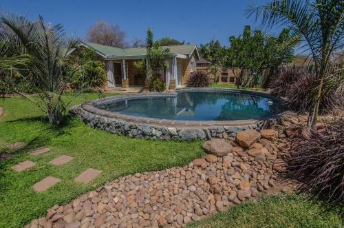 출입구, Chobe River Cottages in 카사네