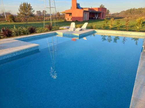 Swimming pool, Basilia - Casas de campo in Carlos Keen
