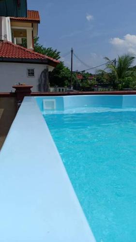 Homestay Port Dickson 4- bedroom corner lot with private pool photo