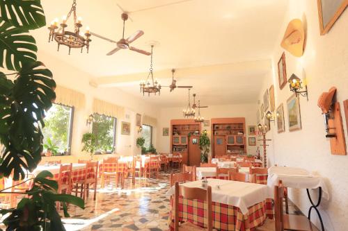Ресторан, Albergo Ristorante La Greppia in Мулацо