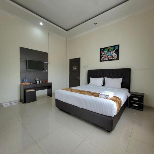 OYO 1326 Mahakam Guest House - Tap to explore photos