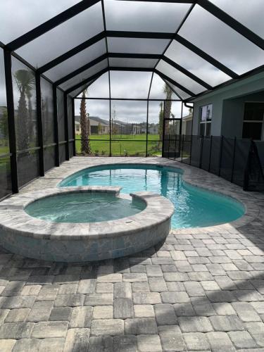 New and Beautiful Babcock Ranch home with Private Screened in Heated Pool