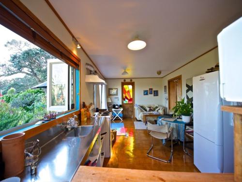 مطبخ, بيثيلز بيتش كوتيدجيز (Bethells Beach Cottages) in بيثيلز بيتش
