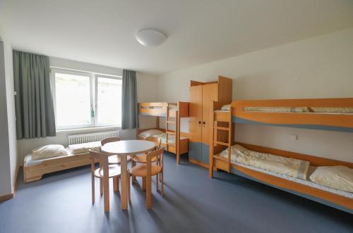 Single Bed in Male Dormitory Room