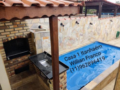 Casa inteira ITANHAÉM Piscina AQUECIDA, Churrasqueira e Wi-fi (Casa inteira ITANHAEM Piscina AQUECIDA, Churrasqueira e Wi-fi) in บัลเนียริโอตูปี