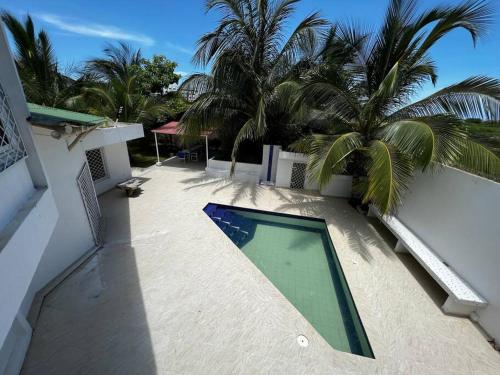 Casa de playa Villa Bonita 4 habitaciones capacidad 12 personas Playa piscina jardines kiosco A 15 minutos de Cartagena