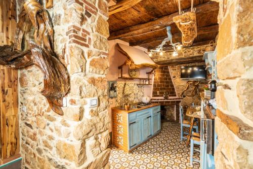  Sa dommu de su maistru ´e linna _SA SCANCìA_ in Baunei