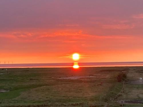 Ferienhaus Frische Brise direkt am Nordsee Deich