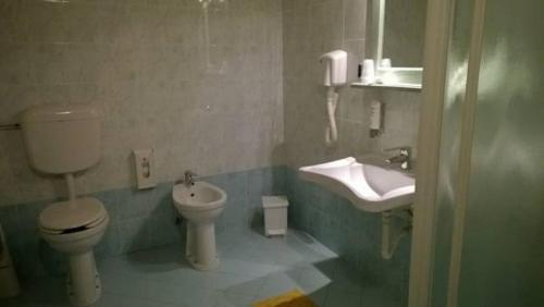 Camera tripla, 3 letti