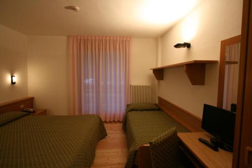 Camera tripla, 3 letti