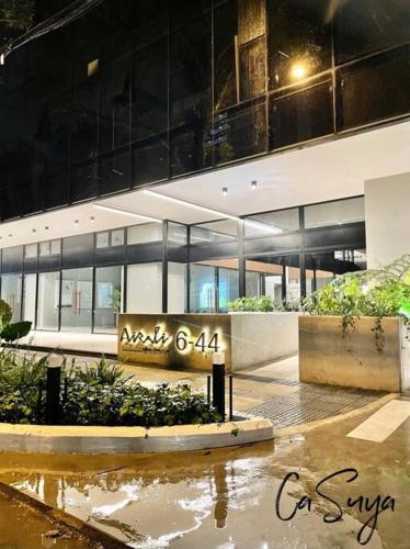 Exterior view, CaSuya Airali apartment with heated pool, gym in city center near Hospital Centro Médico