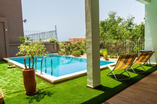 Villa avec piscine privée en bord de mer