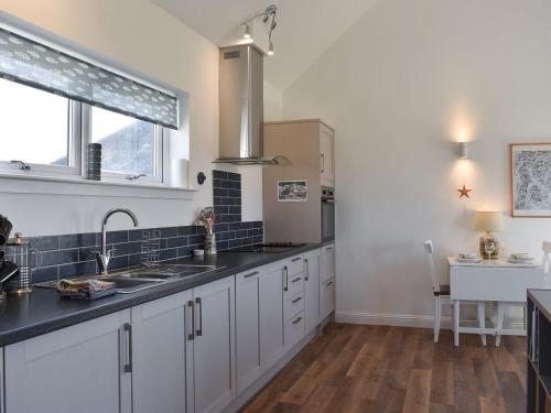 ทัศนียภาพภายนอกโรงแรม, The Stables in โกร็อค