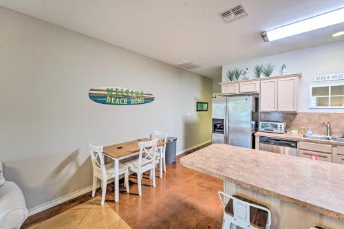 Sunny Townhome with Pool Access about 1 Mi to Beach Sunny Townhome with Pool Access about 1 Mi to Beach