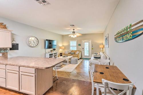 Sunny Townhome with Pool Access about 1 Mi to Beach Sunny Townhome with Pool Access about 1 Mi to Beach