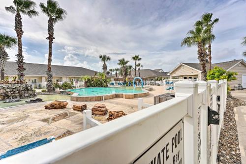 Sunny Townhome with Pool Access about 1 Mi to Beach Sunny Townhome with Pool Access about 1 Mi to Beach