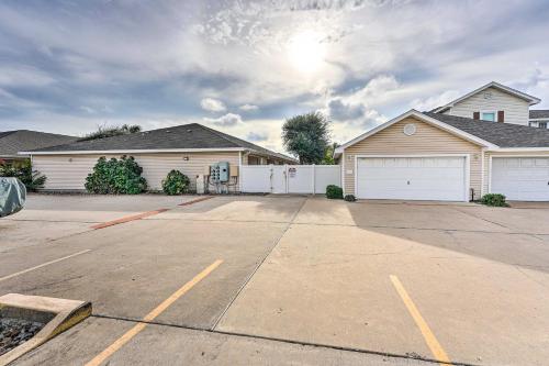 Sunny Townhome with Pool Access about 1 Mi to Beach Sunny Townhome with Pool Access about 1 Mi to Beach