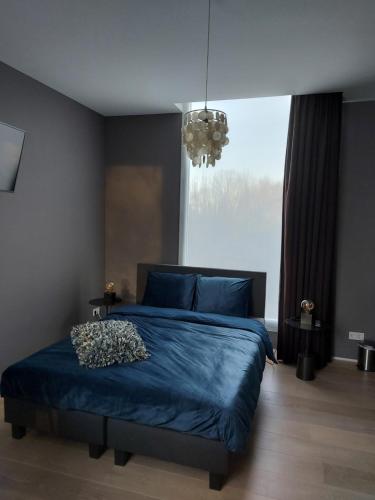  Bed & Wellness Boxtel, luxe kamer met airco en eigen badkamer in Boxtel