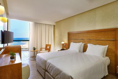 Chambre avec 2 lits, vue sur la mer, 3 lits