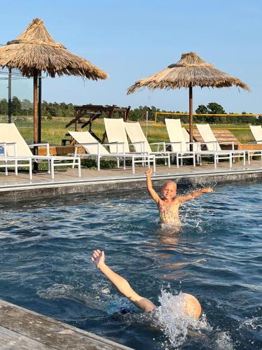 Swimming pool, Hostel Ihre Gard in Ire