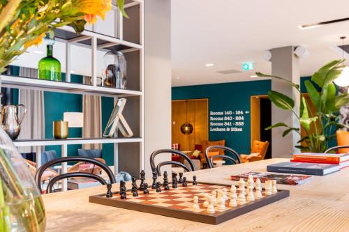 Közös társalgó / TV, Vie Via - Your Hotel in Leeuwarden