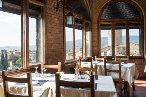 Ресторан, Hotel La Cisterna in Сан - Гіміньяно