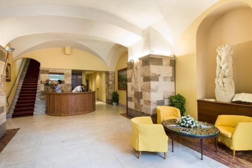 Фойє, Hotel La Cisterna in Сан - Гіміньяно
